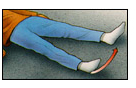 A post operative patient lying on a flat surface doing Abduction exercize
